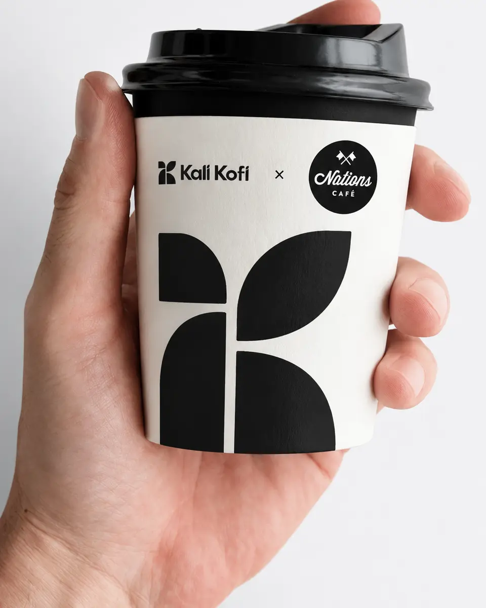 Co-branded coffee sleeve — existing mockup reference